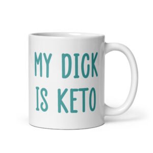 White ceramic coffee mug with the text 'My dick is keto' printed on both sides in turquoise font.