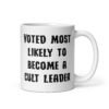 White ceramic coffee mug with the text 'Voted most likely to become a cult leader' printed on both sides.