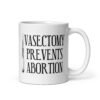 White ceramic coffee mug that has an image of a surgical scalpel and the phrase 'Vasectomy prevents abortion' printed on both sides.