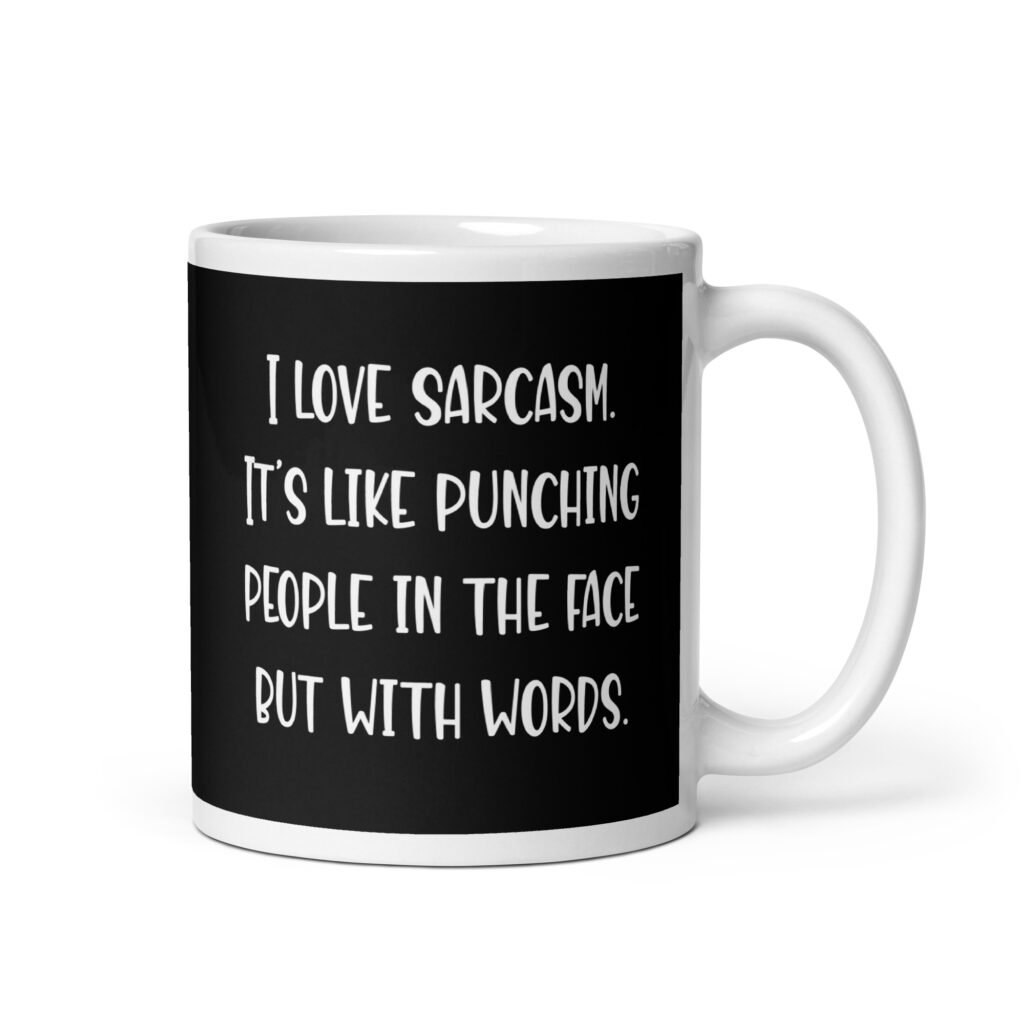 Black and white coffee mug with the text 'I love sarcasm. It's like punching people in the face but with words' printed on both sides.