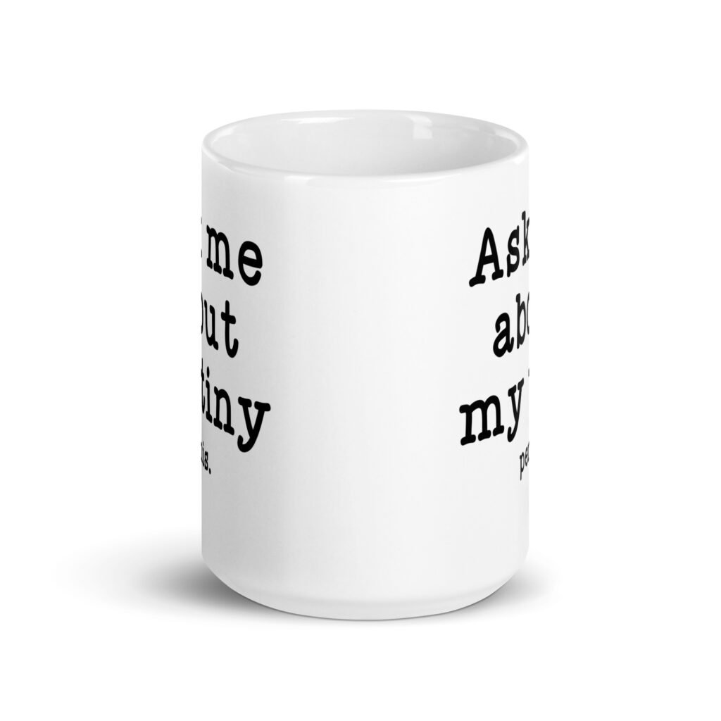 White ceramic mug with the text 'Ask me about my tiny penis' printed on both sides. The word tiny is much smaller than the rest of the text.