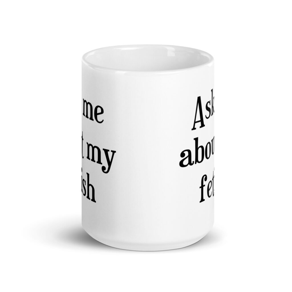 White ceramic mug with the text 'Ask me about my fetish' printed on both sides.