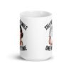 White ceramic mug with graphic of a woman holding a knife and the phrase 'Tell me to smile one more time' printed on both sides.