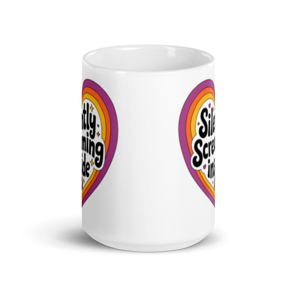 White ceramic coffee mug with a colorful graphic that says 'Silently screaming inside'. The graphics are printed on both sides of the mug.