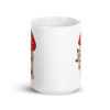 White ceramic mug with an image of a hand over lips making the shh gesture. The words 'Shut the fuck up' are printed on the hand. The graphics are printed on both sides of the mug.