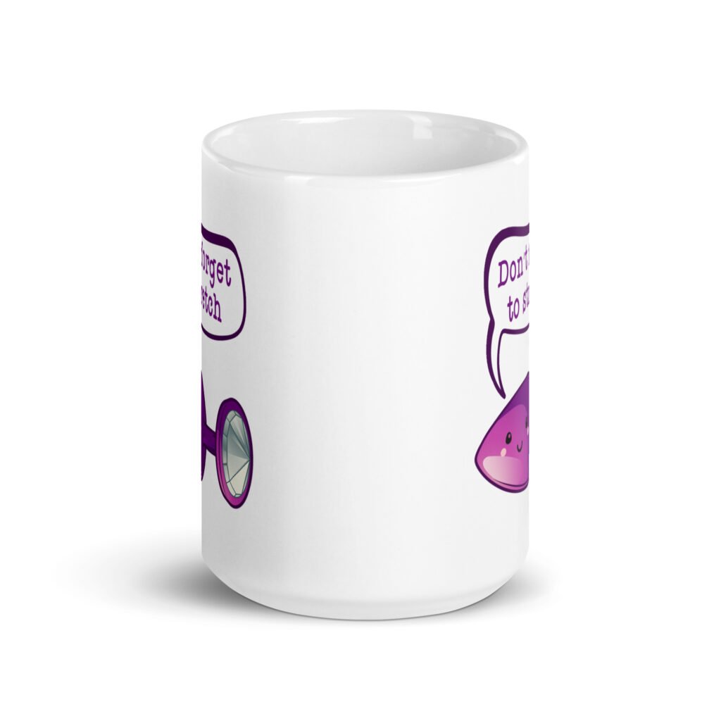 White ceramic coffee mug that has image of a purple anal plug with a smile face. There is a speech bubble above with the words 'Don't forget to stretch'. The graphics are printed on both sides of the mug.