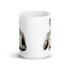White ceramic coffee mug with graphic of retro man holding sign that says 'Ladies, mansplaining is short for man explaining' printed on both sides.