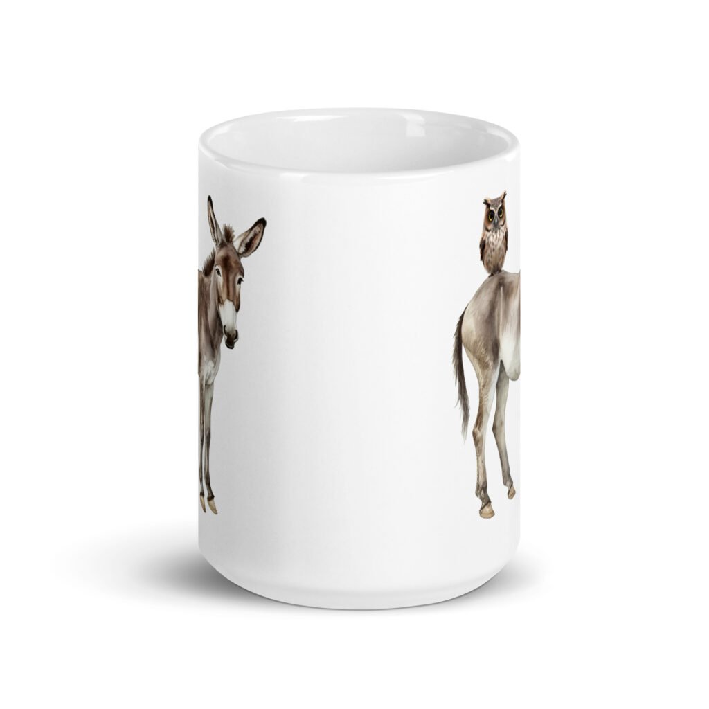 White ceramic coffee mug with an image of a donkey with wise owl sitting on it printed on both sides of the mug.