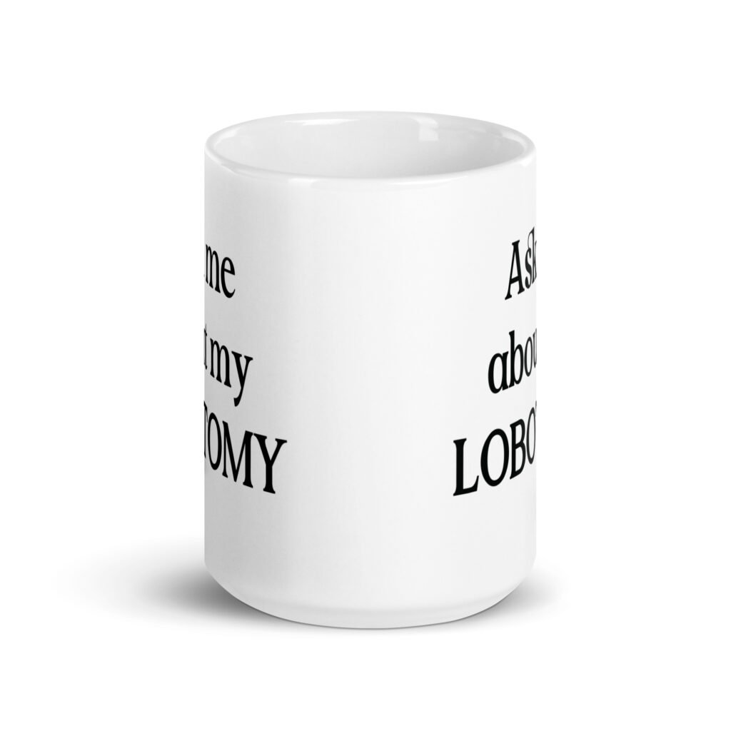 White ceramic coffee mug with the phrase 'Ask me about my lobotomy' printed on both sides.