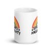 White ceramic coffee mug with a graphic of a rainbow and the words 'Spread negativity' printed on both sides.