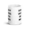 White ceramic mug with the phrase 'Holding back my sarcastic replies takes a lot of inner strength' printed on both sides of the mug.