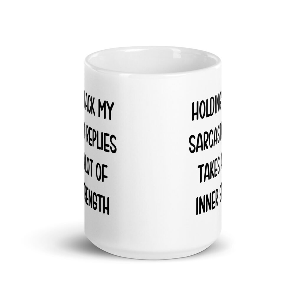 White ceramic mug with the phrase 'Holding back my sarcastic replies takes a lot of inner strength' printed on both sides of the mug.