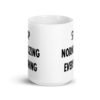 White ceramic coffee mug with the text 'Stop normalizing everything' printed on both sides.