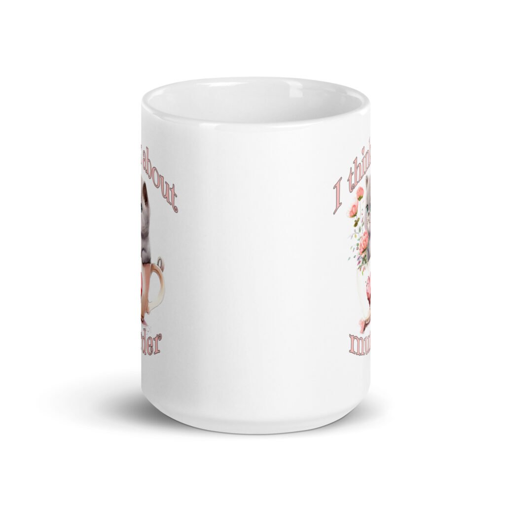 White ceramic mug that says 'I think about murder' with image of cute fluffy kitten sitting in a teacup printed on both sides.