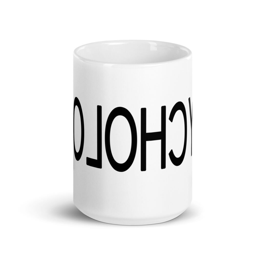 White ceramic coffee mug with the word Psychology printed in reverse. The text wraps around the mug.