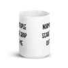 White ceramic coffee mug with the text 'Normal people scare the crap out of me' printed on both sides.