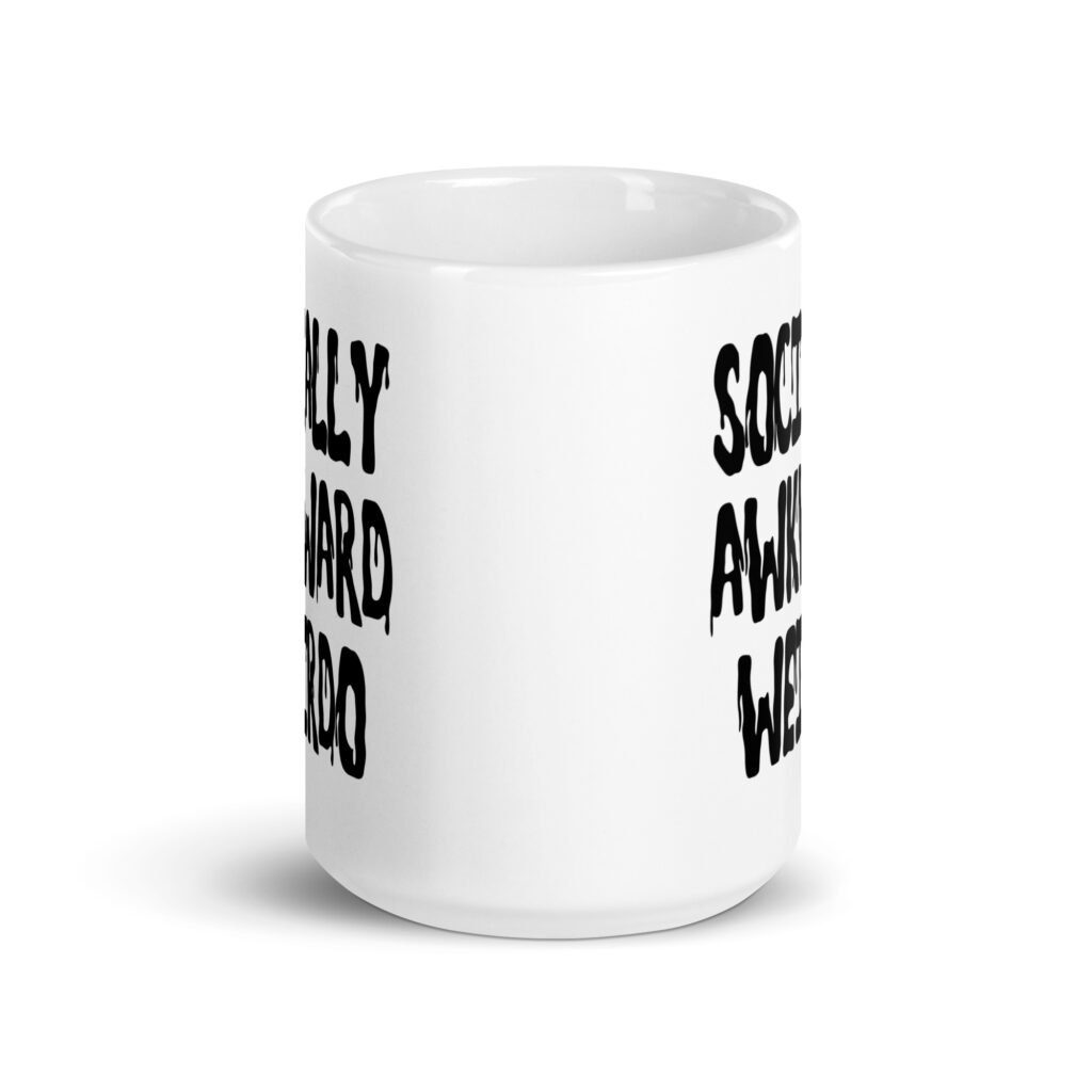 White ceramic coffee mug with the text 'Socially awkward weirdo' printed on both sides.