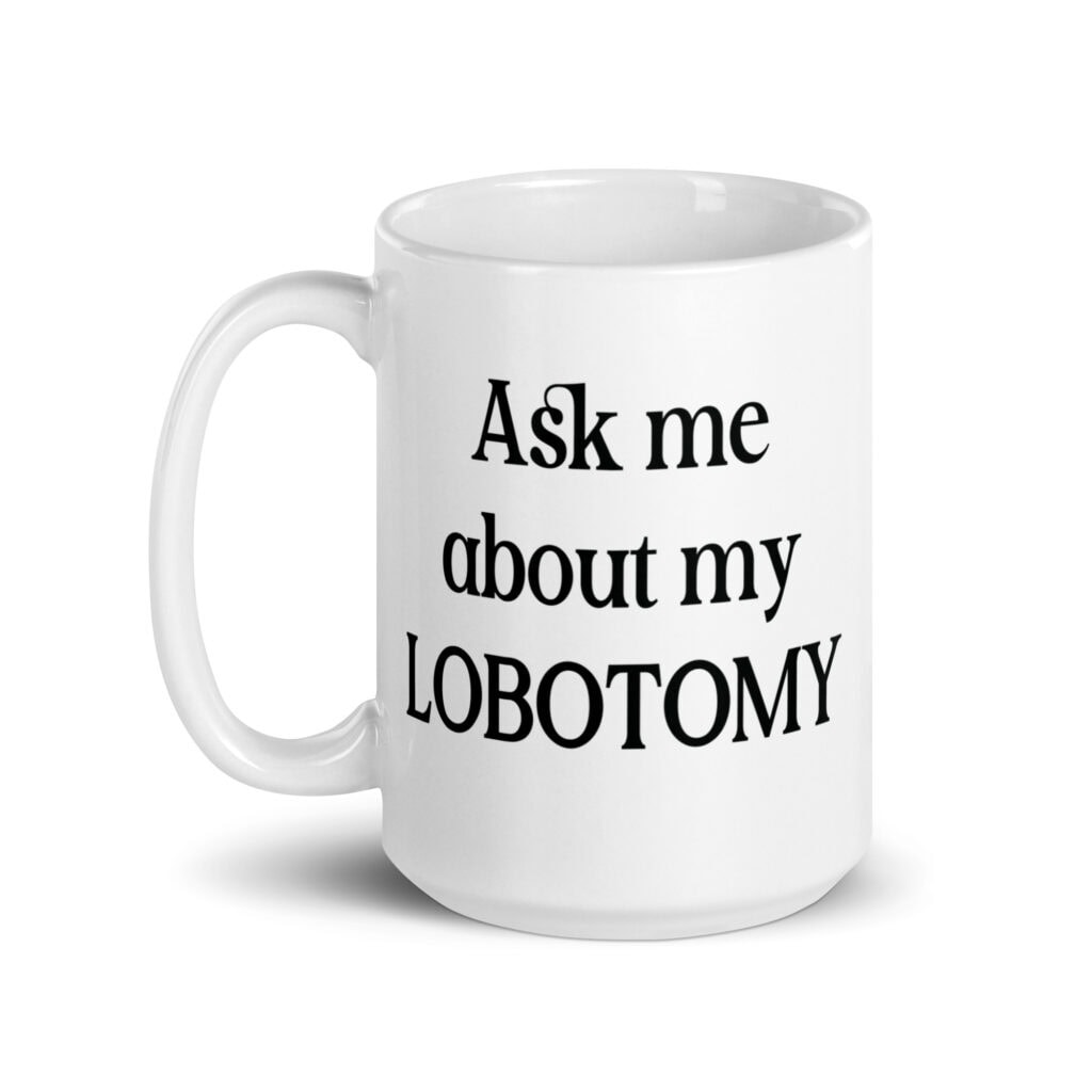 White ceramic mug with the text 'Ask me about my lobotomy' printed on both sides.