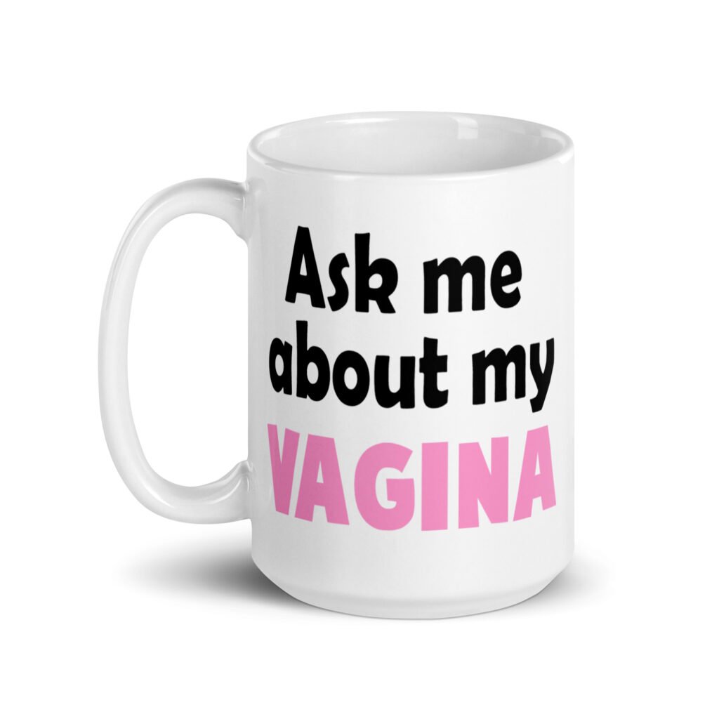 White ceramic mug with the text 'Ask me about my vagina' printed on both sides.