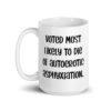 White ceramic mug with the text 'Voted most likely to die of autoerotic asphyxiation.' printed on both sides.