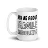 White ceramic coffee mug with the text 'Ask me about fragile masculinity' printed on both sides.