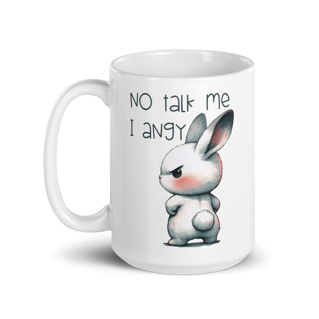 White ceramic coffee mug with an image of an angry bunny and the text 'No talk me I angy' printed on both sides of the mug.