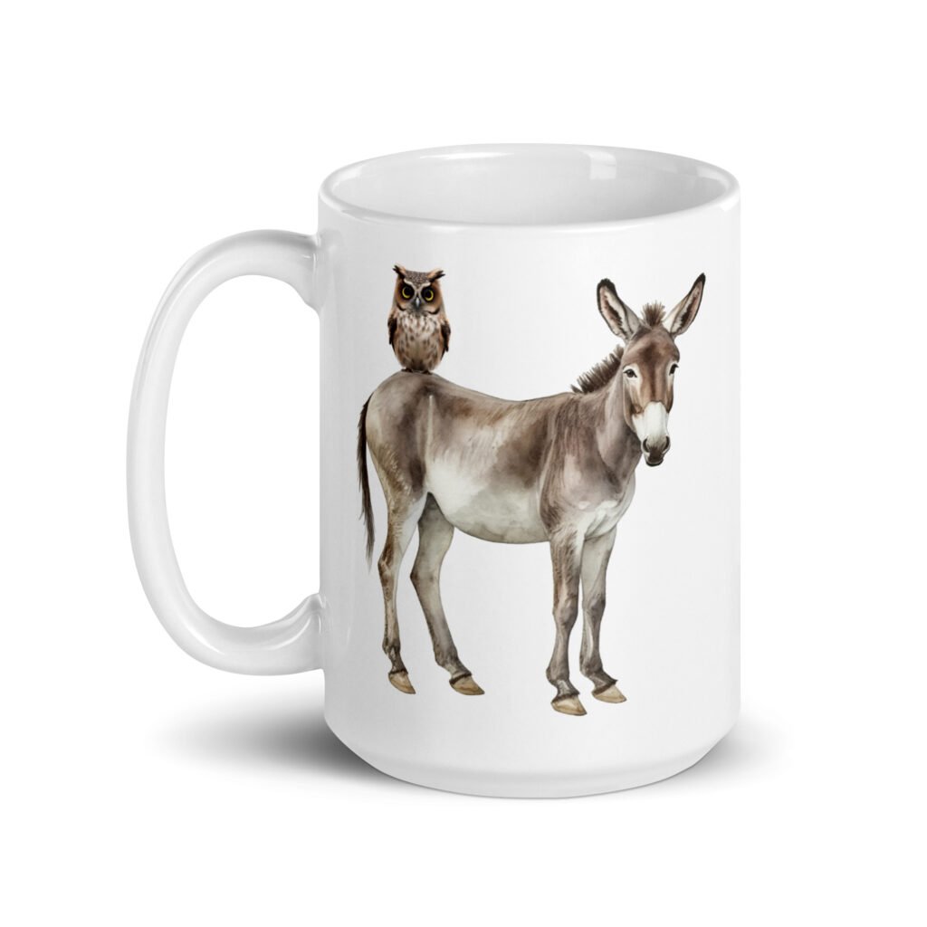 White ceramic coffee mug with an image of a donkey with wise owl sitting on it printed on both sides of the mug.