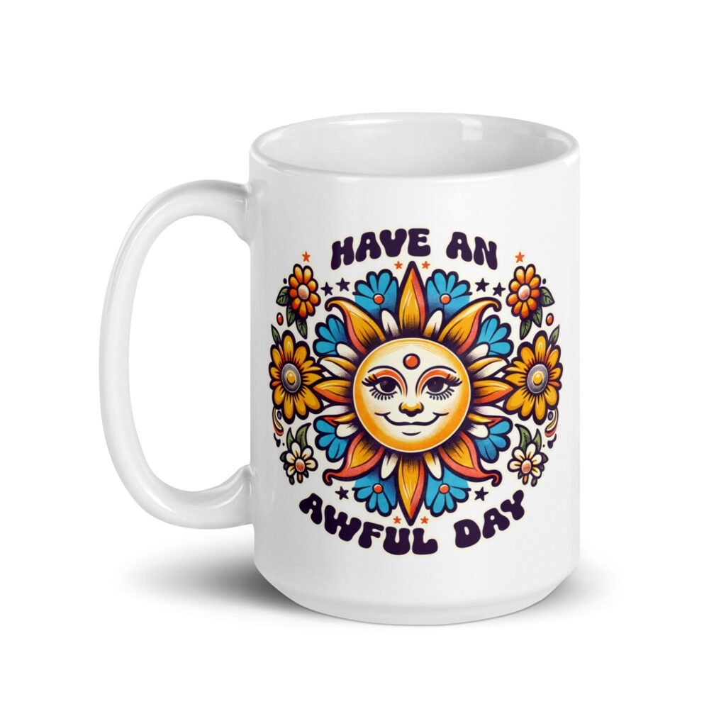 White ceramic coffee mug with a sun graphic and the text 'Have an awful day' printed on both sides.