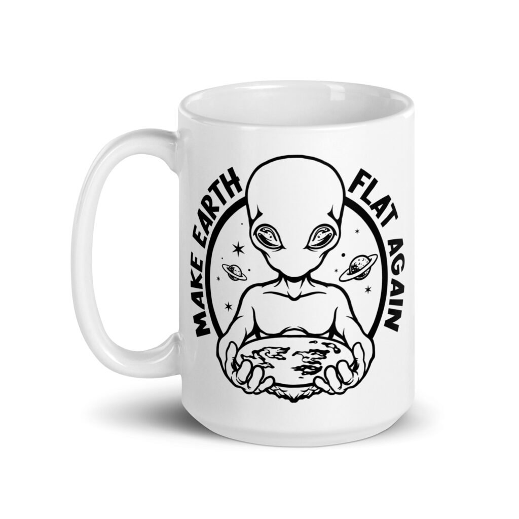 White ceramic coffee mug with an image of an alien holding a flat earth and the phrase 'Make earth flat again' printed on both sides.