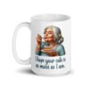 White ceramic coffee mug with an image of grey haired older woman enjoying a bite of a piece of cake with the words 'I hope your cake is as moist as I am' printed on both sides.