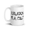 White ceramic coffee mug with the text 'Religion is a cult' printed on both sides.