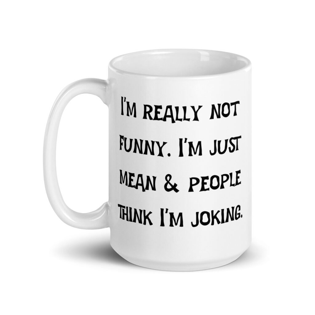 White ceramic mug with the text 'I'm really not funny. I'm just mean & people think I'm joking' printed on both sides.