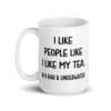 White ceramic coffee mug with the phrase 'I like people like I like my tea. In a bag & underwater' printed on both sides.
