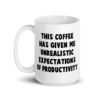 White ceramic coffee mug with the phrase 'This coffee has given me unrealistic expectations of productivity' printed on both sides.