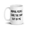 White ceramic coffee mug with the text 'Normal people scare the crap out of me' printed on both sides.