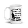 White ceramic mug with image of a cross and praying hands & the text 'If you're a hypocrite and you know it clap your hands' printed on both sides.