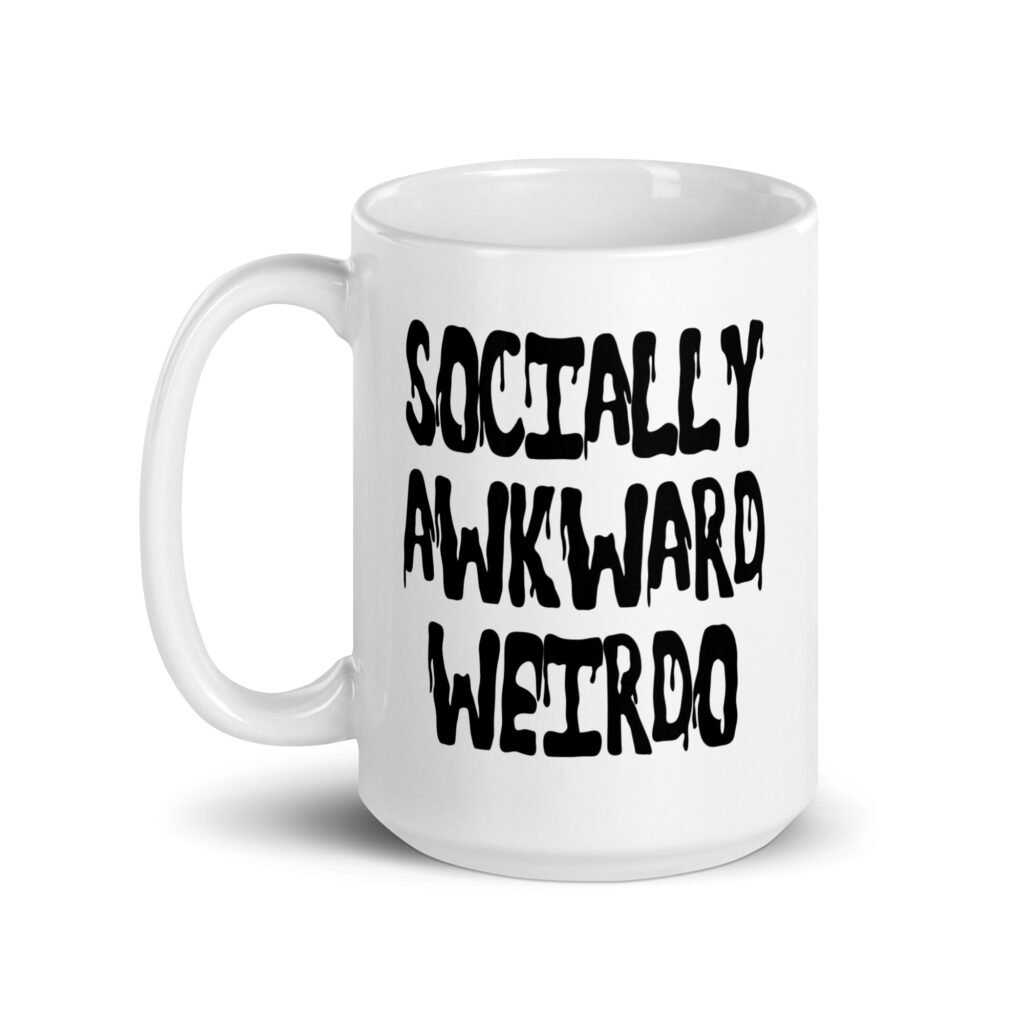 White ceramic coffee mug with the text 'Socially awkward weirdo' printed on both sides.