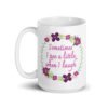 White ceramic coffee mug that has a colorful minimalistic style line drawing floral wreath with the text 'Sometimes I pee a little when I laugh' printed in the center of the wreath. The graphics are printed on both sides of the mug.