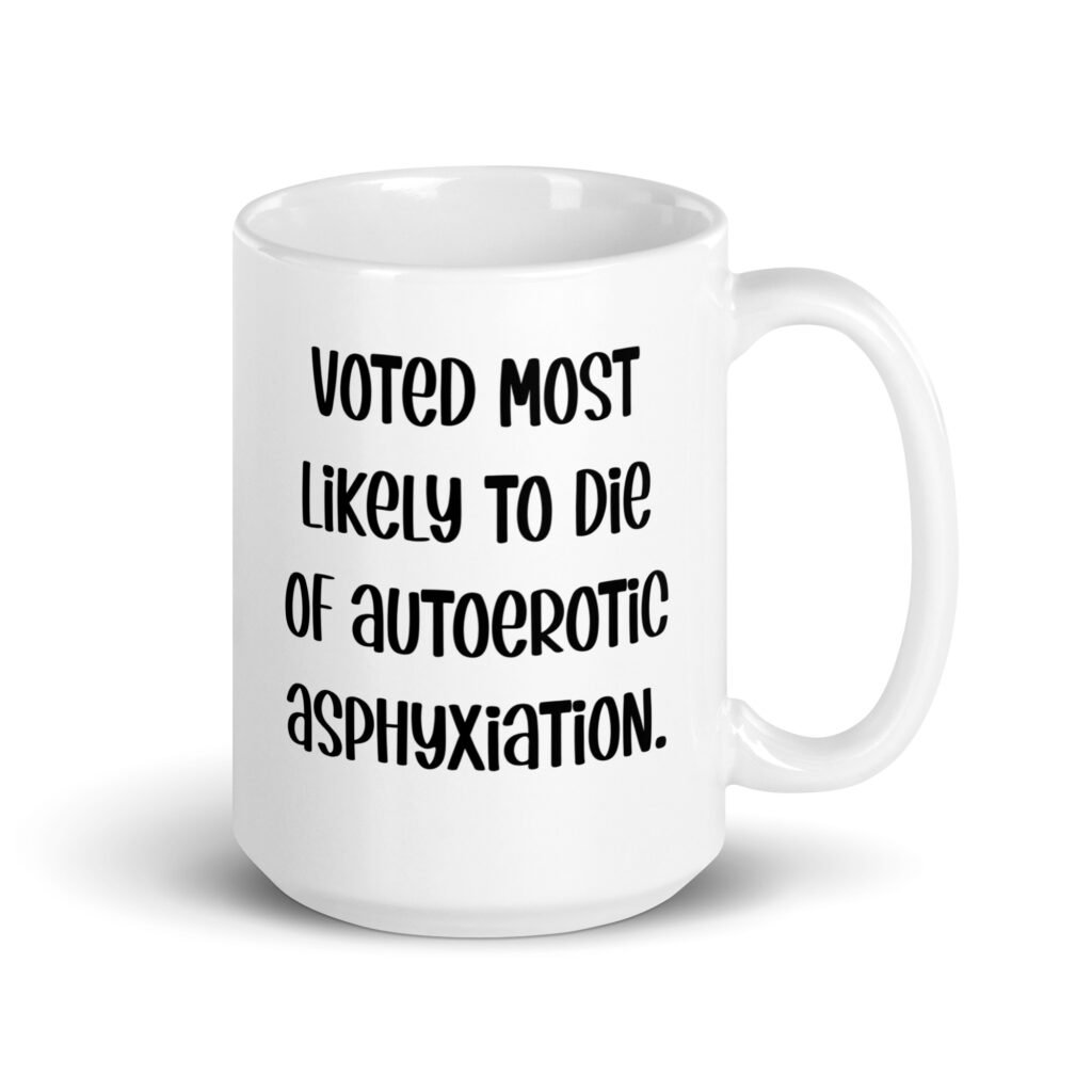 White ceramic mug with the text 'Voted most likely to die of autoerotic asphyxiation.' printed on both sides.