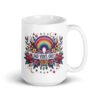 White ceramic mug with colorful boho floral design and the test 'Bad vibes only' printed on both sides.