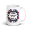 White ceramic mug with a colorful doodle graphic and the words 'I support a man's right to shut the hell up.' The design is printed on both sides of the mug.