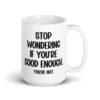 White ceramic mug with the phrase 'Stop wondering if you're good enough. You're not.' printed on both sides of the mug. The words 'You're not' are smaller then the rest.