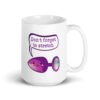 White ceramic coffee mug that has image of a purple anal plug with a smile face. There is a speech bubble above with the words 'Don't forget to stretch'. The graphics are printed on both sides of the mug.