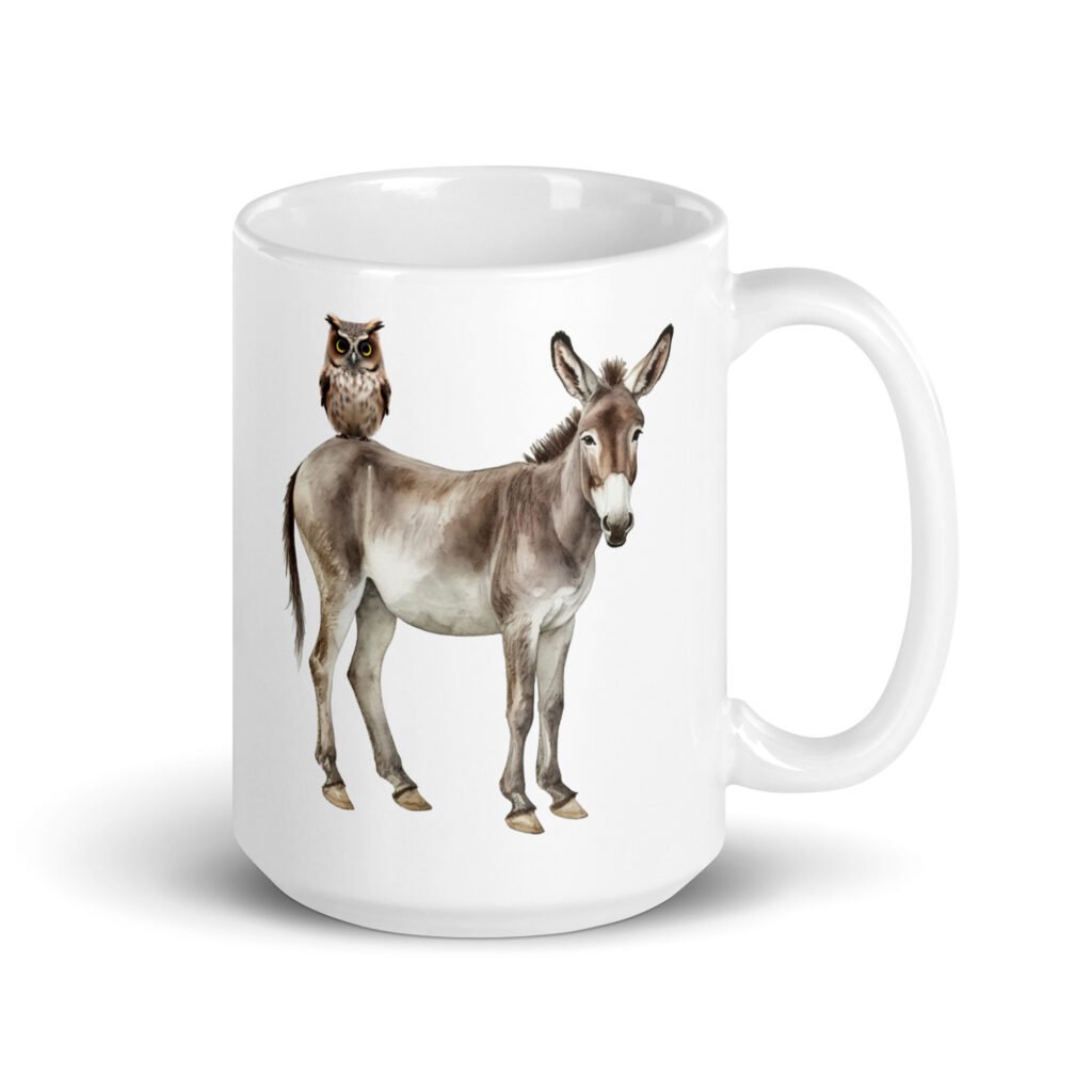 White ceramic coffee mug with an image of a donkey with wise owl sitting on it printed on both sides of the mug.