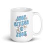 White ceramic coffee mug with a retro daisy and star design and the text 'Stop giving a fuck' printed on both sides.