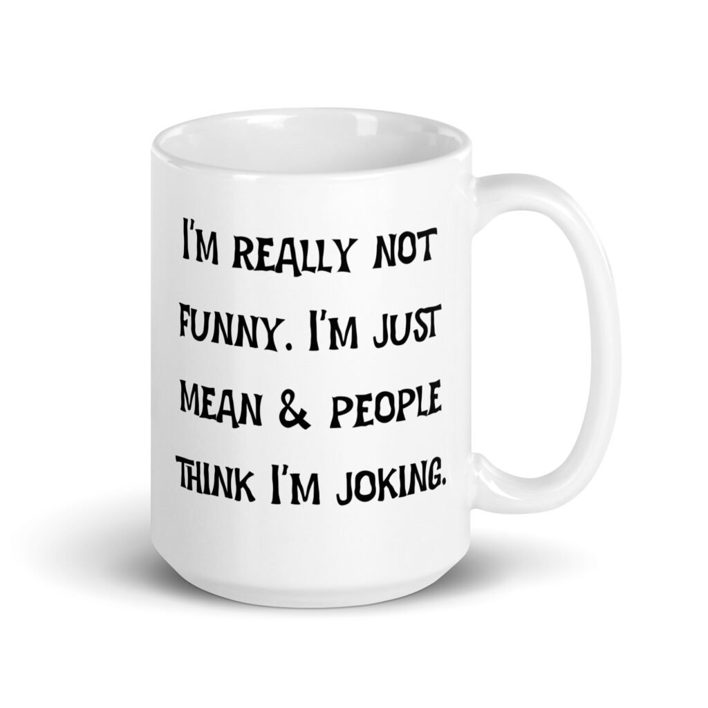White ceramic mug with the text 'I'm really not funny. I'm just mean & people think I'm joking' printed on both sides.