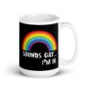 Black and white ceramic coffee mug that has an image of a rainbow and the text 'Sounds gay... I'm in.' printed on both sides.