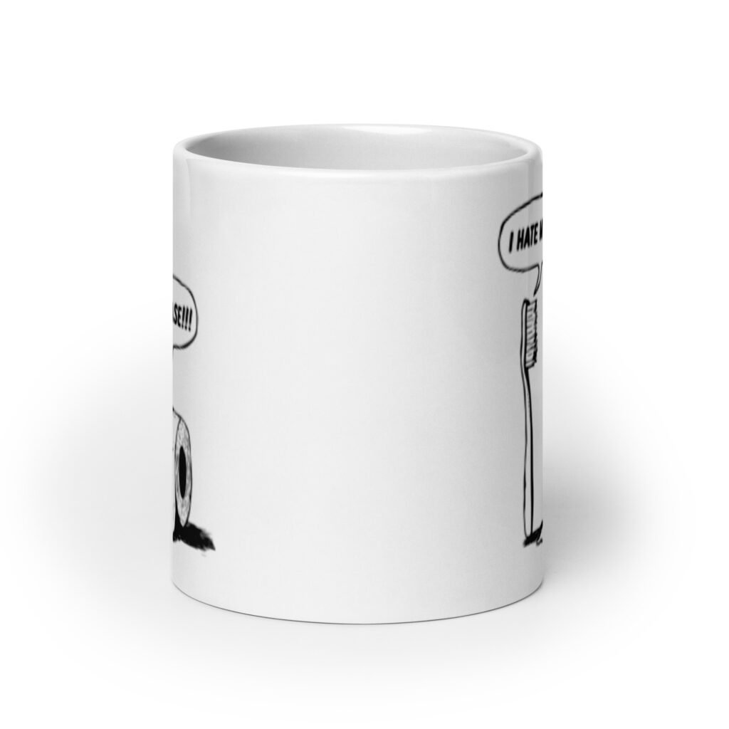 White ceramic mug with a cartoon graphic on both sides. The cartoon is a line drawing of a toothbrush and roll of toilet paper. Both have speech bubbles above . The toothbrush says 'I hate my job' and the toilet paper says 'Oh please.'