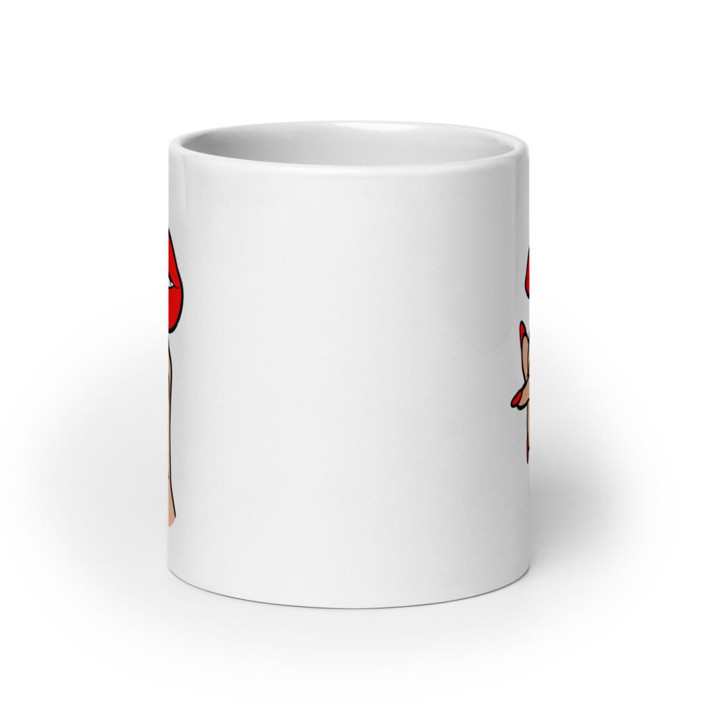 White ceramic mug with an image of a hand over lips making the shh gesture. The words 'Shut the fuck up' are printed on the hand. The graphics are printed on both sides of the mug.