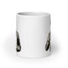 White ceramic coffee mug with graphic of retro man holding sign that says 'Ladies, mansplaining is short for man explaining' printed on both sides.